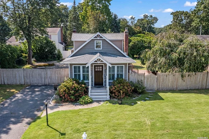 Come & See This Spectacular, Absolutely One Of A Kind Two Story/Traditional Home With All High End Custom Features/Detailwork/Trim (All Work Done In The Last Twelve Years) On Beautifully Manicured .35 Acre Property (With Lots Of Room For Expansion) On A Quiet, Dead End Street Close To Route 25 Shopping, Major Roadways & Just Minutes From Smithaven Mall In Centereach! Beginning With Beautiful Curb Appeal - Wrapped In Flowering Bushes & Tall Shade Trees, A Welcoming Covered Front Porch/Entry Offers Beautiful Details/Trim , Shaker Style Front Door With Dentilwork, Stunning Cut Stone Accent Wall & PVC Railings, And Upon Entering The home You Are Greeted By A Magnificent Light & Bright, Welcoming Great Room (Front Porch, Living Room, Dining Room & Kitchen) With Gleaming Hardwood Floors, Custom Moldings/Detailwork & Ample Room For Furniture. The Living Room Section Of The Great Room Offers A Stunning Distressed Brick Fireplace With Custom Mantel & Custom Box Paneled/Wainscoted Wall, The Dining Room Section Of The Great Room Offers Ample Room For A Large Dining Room Table & Sliding Doors To A Deck, Herringbone Paver Patio & The Backyard, And The Stunning Kitchen Offers A Spectacular 9&rsquo; Custom Island With Granite Countertops, Barstool Area & Looots Of Serving/Counter Space, Custom Multilevel Cabinetry With Self Closing Drawers, Large Pot Drawers, Custom Cut Stone Backsplash & Details/Trim & Upgraded Stainless Steel Appliances (One Year Old LG French Door Refrigerator With Two Drawer Freezer, Water & Ice Maker). The Beautiful, Inviting Main Floor Bedroom Offers Two Circle Topped Windows, Accent Built In Antique Dresser, Custom Box Paneled/Wainscoted Walls, Sliding Doors To An 8&rsquo; x 12&rsquo; Deck & A Private Half Bathroom With Lovely Pedestal Sink, Large Closet & A Full Sized Samsung Front Loading Washer & Dryer, And A Guest/Full Bathroom Off Of The Kitchen Offers All Beautiful Ceramic Tilework, A Full Bathtub With All Floor To Ceiling Ceramic Tile Walls/Surround & Custom Inlays/Trim, Upgraded Vanity & Fixtures, And Ceramic Tiled Floors. The Beautiful Stairway To The Second Level Offers A Wide Staircase, Beautiful Railings & Glass Insets, And The Custom Designed Second Level Offers A Charming Sitting Area/Gallery (Could Be A Home Office) & A Beautiful Glass Door (With Glass Trim/Accents Above) To The Stunning, Oversized Bedroom With Hardwood Floors, All Custom Moldings/Detailwork, Two Separate Sleeping Areas (Both With Double Sized Beds), Magnificent Built In Closets/Dressers/Drawers & Storage, And A Separate Makeup/Dressing Area With All Custom Built Ins. The Basement Offers Ample Space For A Large Rec Room & Has A Concrete Outside Entrance & Bilco Doors, A Large Separate Unfinished Storage Area (Could Be Finished Into A Home Office) & Utilities - Two Zone Heating System, Separate Hot Water Heater, Upgraded Electric Panel & New Oil Tank, And The Large, Mostly Fenced Private Backyard Offers All Beautiful Landscape, Privacy Hedges, Leland Cypress. Weeping Cherry Tree, Large Brick/Paver Herringbone Patio Off Off The Dining Room,  8&rsquo; x 12&rsquo; Deck Off Of The Bedroom, Beautiful Open Lawns & Grasses With Loooots Of Room For Expansion, A Double Gate Off The Driveway & Additional Driveway/Parking Area & A 10&rsquo; x 10&rsquo; Storage Shed. Additional Features Include: Two Ductless Split AC & Heat Units, Recessed Lighting, Raised Panel Doors, Updated Architectural Roof, Vinyl Insulated Windows & Vinyl Siding, And Much, Much More With Low True Taxes (Without Exemptions) Of: $7824.95. Hurry To See This Truly One Of A Kind, Stunning Home With All High End Features & Upgrades And Picture Perfect Location On A Quiet Dead End Street, Yet Convenient/Close To All...It Will Not Last!