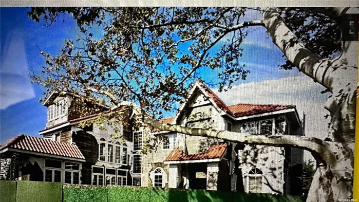 **UNFINISHED MANSION** SITTING ON THE ENTIRE 109 X 100 CORNER LOT OF HOMELAWN STREET & 83 AVENUE-      1- BLOCK FROM SAINT JOHNS UNIVERSITY