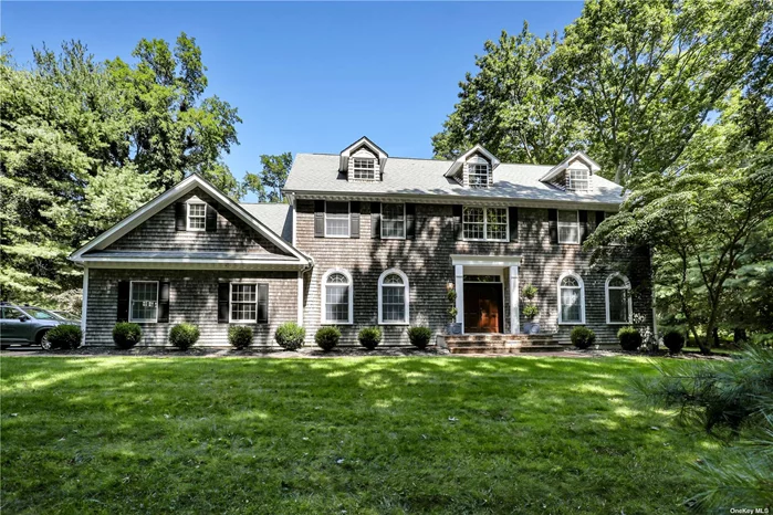 Welcome to this magnificent colonial home featuring 5 bedrooms and 3.5 baths, perfectly situated on a private 2-acre lot in the incorporated village of Old Field. The spacious backyard features an in-ground gunite pool, wood deck, and manicured flat lawn. The house is surrounded by mature trees and gets wonderful natural light. Upon entering through the grand double doors, you&rsquo;ll be greeted by an 18-foot ceiling with brass chandelier. The main floor boasts newly finished hardwood floors, custom moldings, a soaring double-height living room, with a long line of windows facing east. The gourmet kitchen features granite countertops, a large center island, and ample cabinet and counter space. The first floor also boasts a bedroom with adjoining full bathroom ideal for guests or a home office. Upstairs the master bedroom has a double-height ceiling, large ensuite bathroom with soaking tub, and two walk-in closets. The other three bedrooms are all a generous size, with good closet space and natural light. The basement is partially finished. The home is equipped with central air (two zones) and a new hot water tank. Residents enjoy exclusive access to both Whitehall beach as well as the Flax Pond Woods Association private beach. Located within the highly regarded Three Village School District. this home is the epitome of luxury, tranquility and comfort.