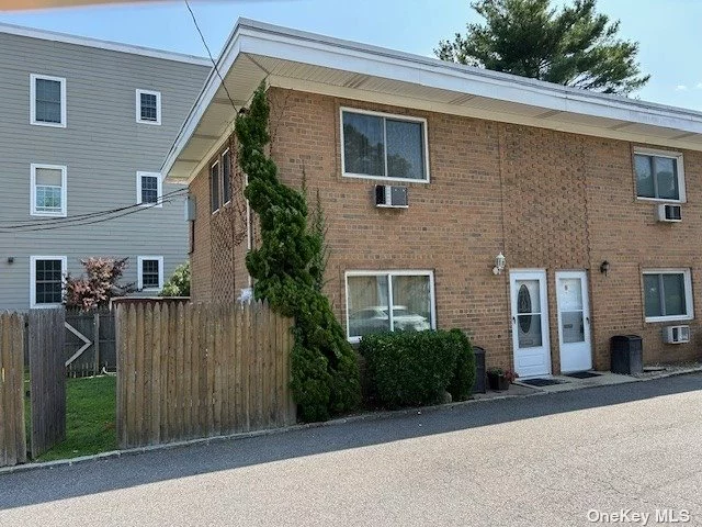 Well maintained two-floor duplex townhouse, located in the award-winning Hewlett-Woodmere School District 14. This townhouse features two bedrooms, one full bath, dining room, living room. Gas heating, updated appliances: Washer/dryer, stove, and refrigerator. Outdoor rear patio: Private backyard space with a storage shed. One assigned spot and plenty of street parking. Near LIRR, shopping and dining. 20 minutes to JFK Airport, 15 minutes to the beaches. Near houses of worship.