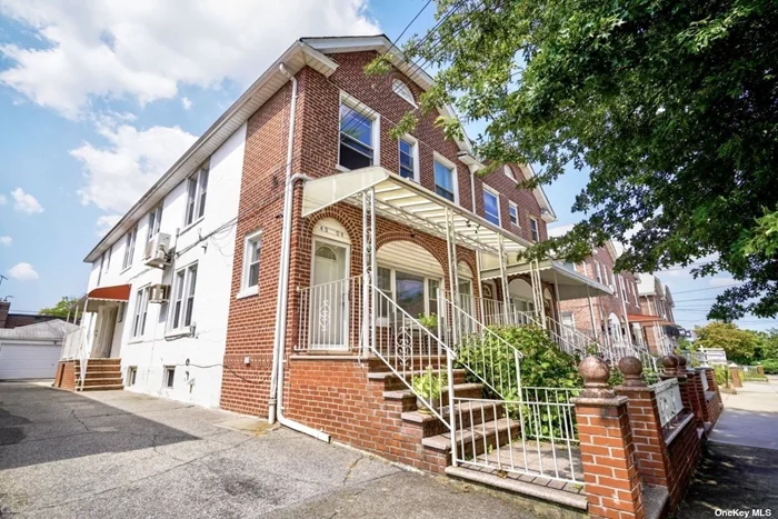 Bayside Large Semi-Detached Two-Family Brick House. Lot size 30*120, building size: 20*66. Features 6 bedrooms and 5 bathrooms (3-bedroom & 2-bath each on first and second floor), finished basement with office, storage room, additional space, 1 bathroom and separate outside entrance. Driveway, 2-car detached garage. Located in SD 26, near schools, playground, shops and restaurants on Francis Lewis Blvd, Northern Blvd. L.I.R.R. train station, Q-13/12/27/76 buses, Clearview Expressway.Must see!