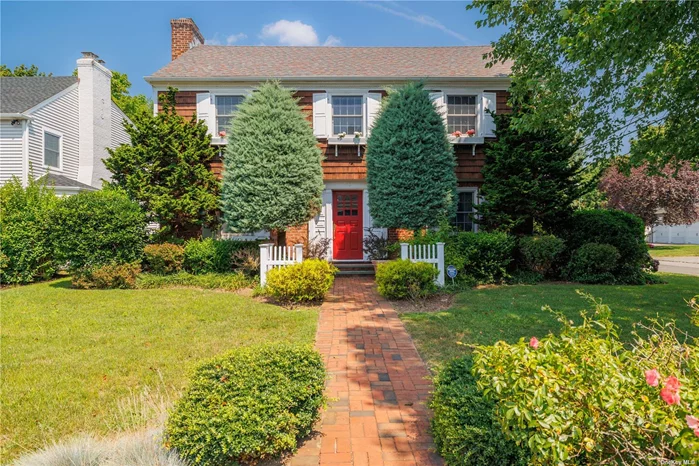 Welcome to 180 Cherry Street, a stunning 2, 600+ square foot center-hall colonial in the desirable Old Woodmere neighborhood (Hewlett-Woodmere SD). This elegant home seamlessly combines classic charm with modern amenities, offering a spacious and comfortable living experience. As you enter, you&rsquo;re greeted by a formal living room featuring a cozy wood-burning fireplace, perfect for gatherings or relaxing evenings. The large den is bathed in natural light, creating an inviting space for both family time and entertaining. The heart of the home is the expansive eat-in kitchen, equipped with a Viking gas range, sleek granite countertops, a spacious pantry, and ample cabinet space for all your culinary needs. Adjacent to the kitchen is a generous dining room, ideal for hosting dinner parties and holiday meals. A conveniently located powder room completes the main level. Upstairs, you&rsquo;ll find four generously sized bedrooms, including a luxurious primary en-suite with a full bathroom. The additional bedrooms are well-sized and share a hallway bathroom featuring a double vanity. A large attic with a pull-down staircase provides extra storage space. The full basement adds even more functionality to this home, featuring a full bathroom, laundry hookups, and utility access. Throughout the house, you&rsquo;ll enjoy the warmth and elegance of hardwood floors. Additionally featuring central AC, gas heating and cooking, and 200 amp electric service. With its blend of traditional elegance and modern convenience, 180 Cherry Street offers a perfect setting for creating lasting memories. Don&rsquo;t miss the opportunity to make this exceptional property your new home.