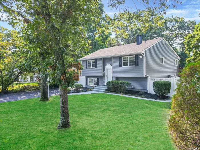 Magnificent oversize high ranch sitting on perfect flat corner lot with a new roof and vinyl siding,  expanded blacktop driveway, shed, White PVC fencing, deck and covered patio, Great for entertaining. This home features an Open floor plan, hardwood floors, Recessed lighting, custom molding, Freshly painted chefs kitchen with Granite Countertops, Cherry cabinets, black appliances, Lots of cabinet and counter space, Second floor ductless CAC, Spacious bedrooms, large bathroom with floor to ceiling tile, two vanities, Tub with shower, first floor possible second kitchen, separate entrance, Tile floor, recessed lighting, large bedroom, Bathroom with standup shower, floor to ceiling tiles.