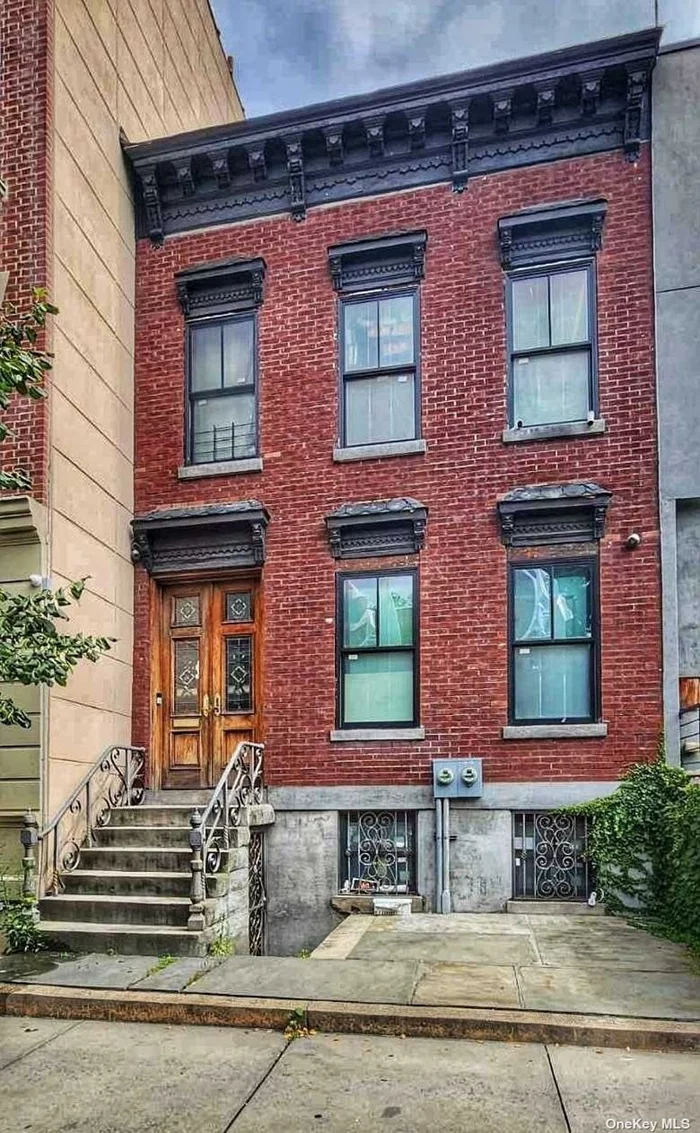 Welcome to this townhouse-style two-family home located in the sought-after South Slope neighborhood. The property features a ground-level apartment with hardwood floors, a spacious living room, a well-appointed kitchen, and direct access to the yard. The upper duplex offers three bedrooms, including a main bedroom with a cozy fireplace, and a full bath. The lower level remains fully unfinished, providing an excellent opportunity for customization. Enjoy the vibrant mix of local shops, cafes, bars, and restaurants, primarily small businesses along 5th Avenue The area offers convenient access to Prospect Park, a major attraction for families. The park features expansive green spaces, playgrounds, sports facilities, and community events. The neighborhood is well-connected by public transit, with the R train running along 4th Avenue and the F and G trains available at nearby stations. With your vision and renovation, this can be an amazing home. This home is in need of a Full Renovation. Ideal for cash buyers or non-traditional financing options.