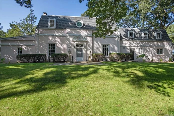 This Gatsby Era home styled after a 18th century French Chateau is filled with charm and personality. From the great room that is the center of the home (once used historically for dances and receptions), to the newly remodeled kitchen, freshly painted interior and newly refinished wood flooring the home is grand yet inviting. Rich in history and locally known as the Museum this is a special residence that will be attract anyone who would love to live in a home from a bygone era that has been recently updated. Located in the Village of Nissequogue in Suffolk County on the North Shore of Long Island, it is close to local beaches, hiking trails, fine dining, and Stony Brook University and Medical Center. Smithtown Schools