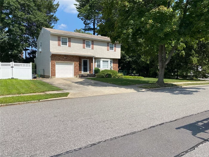 A TRUE COLONIAL in the heart of Bethpage. Spacious primary bedroom with large closet; other 3 bedrooms also spacious. Basement has OSE. This home is a blank canvas; make it your dream home; needs some TLC. Window A/C&rsquo;s as gift. Basic Star savings $1, 121.