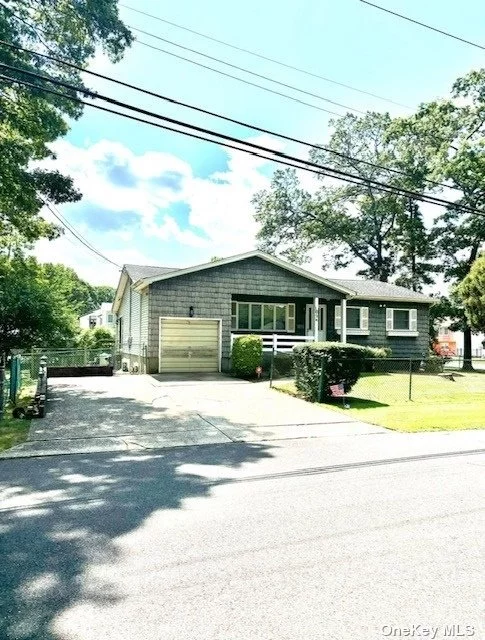 Ranch home featuring an eat in Kitchen with a living room, den or office, main bedroom room has bath and 2 other spacious bedrooms with full bath. On the lower level is the utility room and extra storage  and  laundry room. Large 75 x 200 property in the West Islip School District, 1 car garage and oversized driveway. Inground sprinkler system and 200 amp electric. Anderson windows. taxes are $13408 without star