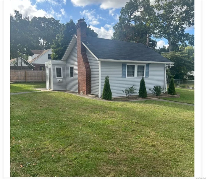 Renovated ranch with a new paver patio, new roof, new floor, new bathroom, kitchen with new Quartz countertops, new refrigerator and stove, good location 12 mins from the train station, 9 mins from Smith Haven Mall and 7mins from LIE