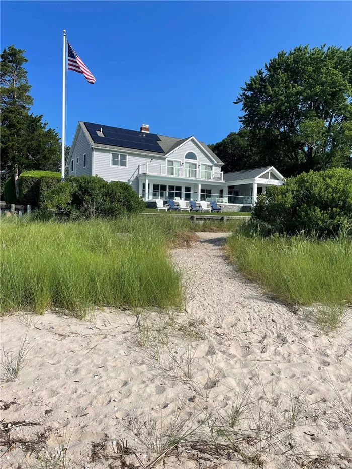 Discover the charm of Aquebogue, NY, with our newly renovated beachfront retreat. This stunning home sits directly on the bay, offering a heated pool surrounded by a bluestone patio and an inviting gas fire pit-perfect for memorable family gatherings. This modern, immaculate home boasts direct beach access, encouraging morning kayak trips in the Great Peconic Bay and quiet exploration of shores and coastline. Finish your days with cocktails on the lawn while watching boat traffic slide across the bay. The house features an elegantly appointed primary bedroom complete with a balcony overlooking the bay and a luxurious ensuite bath. Accommodating guests comfortably, there are three additional bedrooms and 2.5 more baths, ensuring ample space for everyone. Work from home with solid internet and a comfortable office with water views. Positioned on the beautiful North Fork, this property is an ideal starting point to experience the region&rsquo;s allure, from its lush farmstands and distinguished vineyards to a wide array of dining options, ranging from fine to casual eateries. Embrace the opportunity to live in a slice of paradise, where luxury meets the tranquility of beachside living.