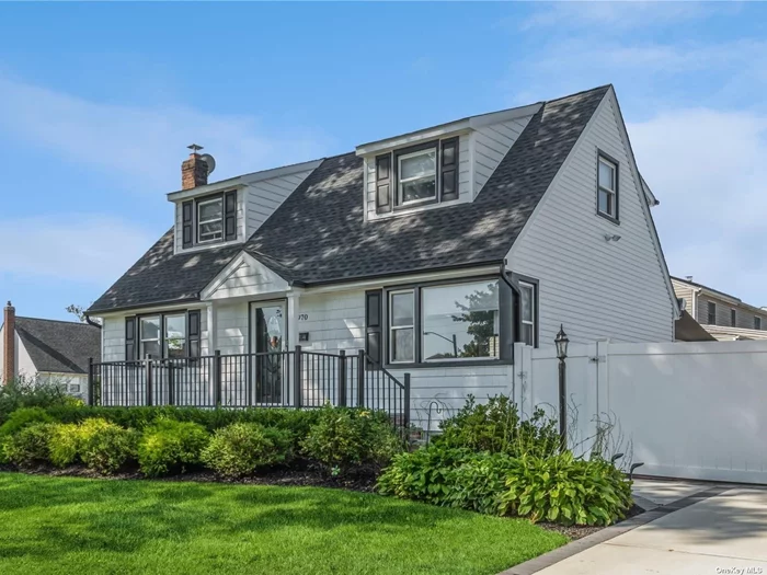 Seaford: Beautiful Cape Cod contemporary renovated in 2022 offering 4brs, 1.bths, hardwood floors, cac, stainless appliances, da, kitchen combo. sliders to deck w above pool, Vaulted ceiling in Primary Bedroom, expanded driveway, 1yrold turf in yard, washer dryer new, new awning, custom window & door treatment.