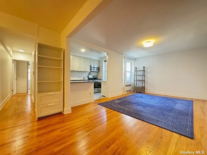 fully renovated stunning Junior 4 in well managed and super quiet coop. A commuter&rsquo;s dream!14 minutes to midtown via train. A short walk to both train and hospital. Shopping and authentic cuisines abound; all accessible via a few steps away. Large corner King sized one bedroom unit completely renovated with additional alcove off living room with TWO closets perfect for a home office, playroom or additional bedroom. Inner court yard with 2 exposures. Brand new chef&rsquo;s kitchen with butcher block island. Spa bathroom with all updated fixtures...countless luxurious upgrades to name...must be seen. Custom made closets with LED Lighting and built-in&rsquo;s to showcase and organize your early morning accessorizing ritual. Large windows lighting through out the whole expansive unit...a true oasis for the discerning New Yorker. https://apply.link/3WYrpoG