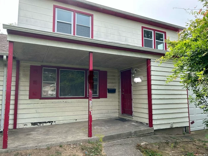 Double Dormered cape enables 4 bedrooms on 2nd floor, hardwood floors throughout, new kitchen and 2 full baths, laundry room in basement, driveway parking. Garage excluded. Convenient location near parkway, stores, transportation.