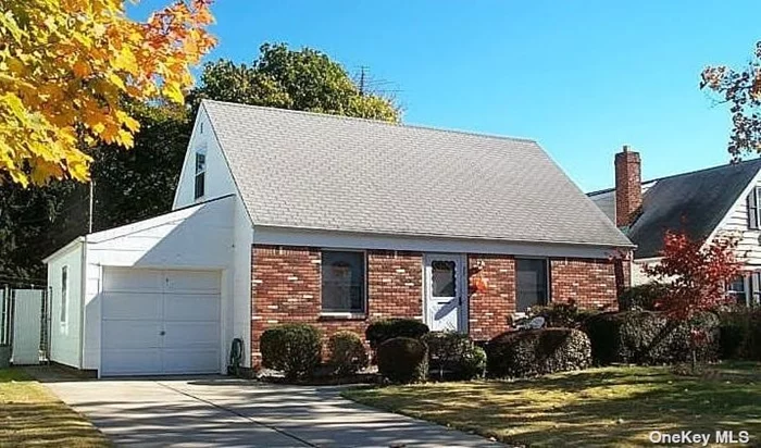 3 Bedroom Cape w/ Park-like property in Franklin Square SD#17. Main Floor Family Rm., Hardwood Floors, Fin Basement. Cozy home as is or expand into a large 4, 000 Sf home (not including basement). Tons of potential in perfect location! Interior pics coming soon