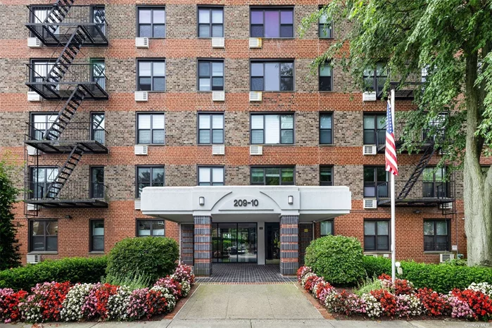 Prime Location! This one-bedroom co-op is just a 5-minute walk to the LIRR, offering a quick 25-minute ride to Manhattan. It is conveniently located near Northern Blvd, Bell Blvd, and bus lines 12/13, providing easy access to restaurants, supermarkets, shops, banks, schools, and major highways. The apartment, located at the back of the building, features new windows (4 years old), a wall-mounted AC unit. Residents can enjoy amenities such as a laundry room, a patio with free WiFi, two brand-new elevators, surveillance cameras inside and outside the building, and an EV charger in the garage. All utilities are included except electricity. The building is well-maintained, with an on-site super and manager, and is situated in an area known for its great schools.