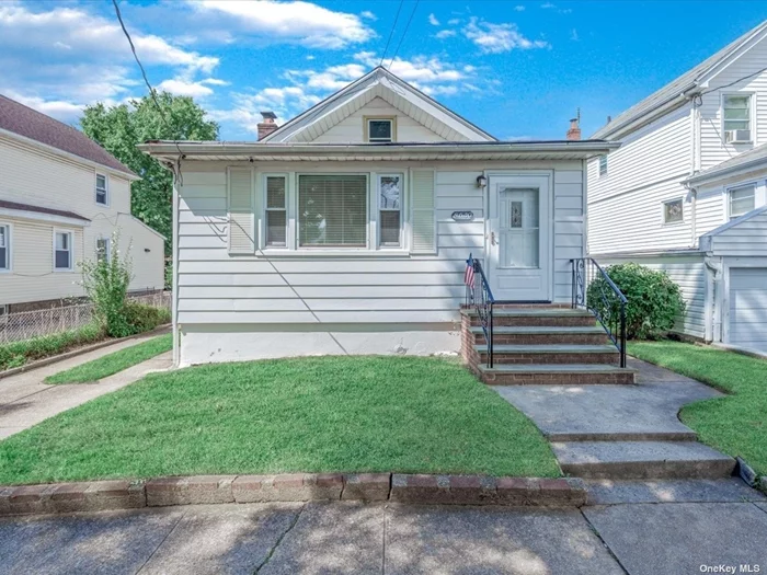 Nestled on a Tree-Lined street in the Floral Park neighborhood sits this Charming Ranch-style home. This inviting home offers an Entry Foyer, Living Room, Kitchen, and separate Dining Room. All 3 Bedrooms and Bathroom are Arranged on the Main Level. The Large Finished Basement includes a Family Room, Half Bath, Utility Room and Separate Office. The home features Beautiful Hardwood Floors Throughout, Double-Pane Windows for energy efficiency, and a cozy Fireplace. This Ranch is on a 40x100ft lot, with a long driveway leading to a 2-Car Garage. The Large Fenced in Backyard has plenty of Green Space and Patio area. Located in a peaceful residential neighborhood, this home provides easy access to Public Transit, LIRR, Parkways, and Schools, blending the best of suburban tranquility with urban convenience.