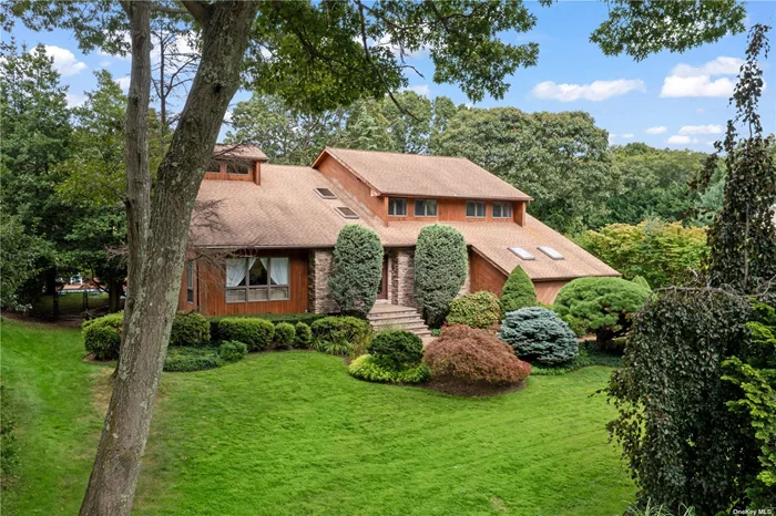 Welcome to your dream home! This beautifully maintained 5-bedroom, 3.5-bath colonial offers the perfect blend of syle and comfort. As you step inside, you&rsquo;re greeted by soaring ceilings that create an open and airy atmosphere throughout the home. The formal dining room is ideal for hosting dinner parties, while the spacious eat-in kitchen is ready to entertain with gas cooking, double ovens and a generous center island. The large family room is perfect for gatherings, featuring expansive windows and access to the outside covered deck. The primary bedroom is a true retreat, boasting cathedral ceilings, a generous walk-in closet, and a luxurious ensuite bathroom with high ceilings, a separate Jacuzzi tub, a glass-enclosed shower, double sinks, and a vanity area. Step out onto your private balcony from your bedroom and take in the serene views of your backyard oasis. Outside, the property truly shines with an in-ground pool perfect for summer days, and a private tennis court complete with an observation deck for spectators. Whether you&rsquo;re entertaining guests or enjoying a quiet afternoon, this backyard is designed for relaxation and fun. Located on a peaceful cul-de-sac, this home offers easy access to all major parkways, shopping centers, and the Long Island Rail Road. Don&rsquo;t miss your chance to own this extraordinary property - schedule a viewing today!