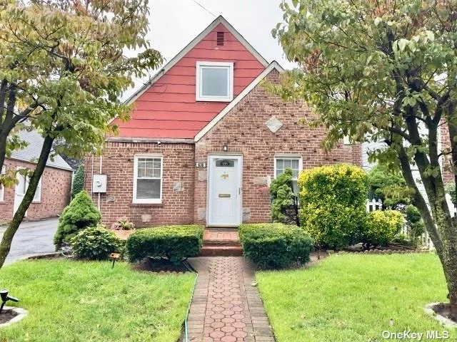 Welcome to the 636 Tulip Ave. 4-bedroom cape on a tree-lined street in the village of Stewart Manor.