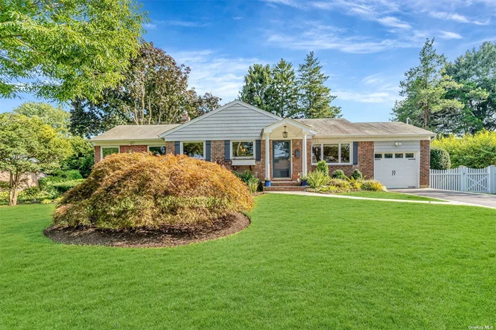 Welcome to this beautifully renovated expanded ranch in the heart of East Northport. This inviting home features three spacious bedrooms and three pristine bathrooms. The updated kitchen offers newer appliances, quartz counter tops with ample cabinetry. The expanded family room boasts vaulted ceilings and an abundance of windows. This airy, light-filled space features sliders that lead onto a deck overlooking the beautifully landscaped and fully fenced yard. Gleaming hardwood floors, exquisite crown molding and trim work, extend throughout the home, creating a seamless flow and a sense of refined luxury. A finished basement with a separate outside entrance, perfect for an in-law suite, home office, or recreational space. Whole house water filtration system. Don&rsquo;t miss the opportunity to own this exceptional East Northport home that combines modern updates with classic charm and a touch of elegance.