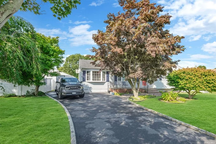 This charming ranch home located in the desirable Lake Hills Acres of Ronkonkoma situated in the sought-after Connetquot school district and low taxes under $10, 000. The home features three bedrooms and two full bathrooms, a spacious living room, kitchen, and a large great room for entertaining. The full basement is partially finished with an outside entrance, offering income potential with some work and proper permits. Additional features include an extra large two car detached garage, perfect for storage or a workshop. Nestled in a quiet neighborhood. Don&rsquo;t miss out on the opportunity to make this your dream home!