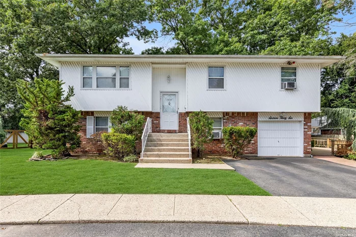 Tucked away on a cul-de-sac, this home is not on a main road. Built in 1983 with 1972 interior square feet. Walk into your open and airy living room and formal dining room leading into your oversized Eat-in-kitchen, stainless steel dishwasher and refrigerator. Sliders open to a deck overlooking your park like property. Hardwood flooring.. Large main bath with dual entry to your primary bedroom. 2 additional nice size bedrooms. Washer/Dryer. Lower level has a great layout with a large family room with access to your private patio/backyard. Two bedrooms,  and an extra room and full bath. Full Attic, Natural Gas heat. All nestled on 69 x 110 property. Fabulous Home....