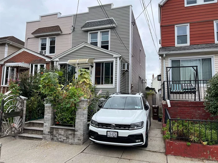 Location ! 1 family semi detached home located in Ozone Park. Home features 3 bedrooms, 1 bath, full finished basement with separate entrance and a detached 2 car garage.. Just minutes from belt parkway, Cross Bay Blvd shopping, public transportation, and schools.