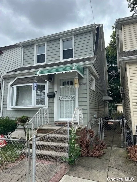 Renovated One Family Home in the Heart of Centerville, Ozone Park. This Large 2 Bedroom & 2 and half Bathroom Home Features 3 Levels of Living Space, Plus a Partially Finished Basement with a Laundry Room, Spacious Unfinished Attic. Lots of Updates & Extras; New Laminate Flooring, Updated Kitchen with Quartz Countertops and New Appliances, Custome-Built Pantry, New Doors, New Windows, New Boiler, New Water Heater, New Roof, Freshly Painted, Stained Glass Window, Big Bay Window with Lots of Natural Light, Stairs to Attic, Large Yard, and a Detached One Car Garage with a Private Driveway. Near transportation, Schools and Park.