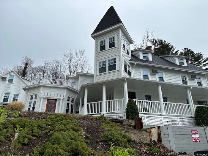 One of the most beautiful rental properties in all of Northport directly across from the harbor. This Historic Home was custom-built in 1880. With its High Ceilings, Wrap-around Porch, and Intricate Woodwork, its features are Magnificent. There are 6 units in all, 5 in the Main House and 1 Cottage behind the House. All with Unobstructed and Spectacular Water Views. Each unit is Stunning, from the smallest to the largest. Gorgeous Wood Flooring and Ultra-Modern Amenities make these apartments the most sought-after in Northport Village. The Entire Home was completely renovated in 2018 while keeping most of the Beautiful rich and detailed woodwork of the original era. Renovations and upgrades include New Windows, New Air Conditioning Units, Plumbing, Electric, Gas, Roof, Hardie Board, Siding, Kitchens, Bathrooms, Appliances, Floors, Doors, Remodeling, and well-designed Landscaping. There are 8 Designated Private Parking Spots. Each unit with completely independent air conditioning, electric, gas heat, washer/dryer, individual gas boilers, and hot water heaters. All with state-of-the-art appliances, original refurbished wood floors, beautifully detailed and original *non-usable* fireplaces (village code), and some with beadboard and high ceilings. 4 of the units have their own private outdoor space. Net Operating Income estimated at $192, 000.00, inclusive of market rate for one of the apartments which is rented to a family friend for $1, 200 per month below market. All Apartments Fully occupied.