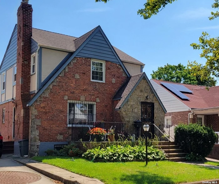 This magnificent 3-bedroom brick and stucco Tudor nestled in charming Cambia Heights is a home buyers dream come true. Impeccably manicured hardwood floors spraddled throughout this elegant home. Inviting living room with working fireplace, framed with chiseled stone, formal dining room, central air, upgraded kitchen with lavish granite flooring, posh master bedroom including a walk-in closet, bathroom adorned with a porcelain sink, custom built tub with jacuzzi, and heated floors, full basement with spacious living area, delightful kitchen, full bath, storage area and enclosed laundry unit. The large private, peaceful backyard has a one car garage, beautiful deck and canopy and a very large shed for storage. This is a MUST SEE!