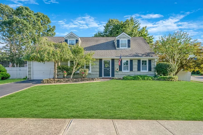 Discover this spacious cape featuring 4/5 bedrooms with 2 full bathrooms and an attached 1-car garage. Perfectly situated on a .23-acre corner lot in the desirable Birchwood area of Port Jefferson Station. Located within the Comsewogue School District, this well-maintained gem combines classic charm with modern convenience, offering everything you need for comfortable living. Upon entering, you&rsquo;ll be greeted by an abundance of natural sunlight that brightens every corner of this inviting home. The versatile layout features a welcoming living room, a spacious kitchen, a separate dining room, and a cozy family room, providing ample space for both relaxation and entertaining. The home boasts a flexible floor plan with the potential for a fifth bedroom or home office, tailored to fit your lifestyle needs. Many updates include new appliances, new boiler and oil tank, new front windows, new tile flooring and carpet, new bathroom vanities and toilets, 200 amp electrical service, central air. Step outside to find a beautifully manicured lawn, complemented by an in-ground sprinkler system that ensures easy maintenance. Check out the Pinterest-worthy soaking pool, a perfect oasis for summer enjoyment and outdoor gatherings. Don&rsquo;t miss your opportunity to make this dream home yours - schedule your viewing today!