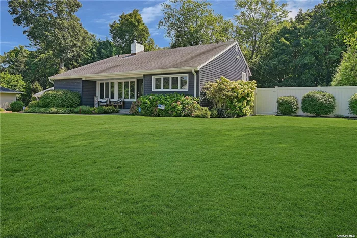 Welcome to 15 Old Town Lane, Huntington, NY! This beautifully renovated home is move-in ready and waiting for you to create new memories.As you enter this delightful home, you&rsquo;ll immediately notice the large rooms, cathedral ceilings, and open feel that provide a bright and welcoming atmosphere. The spacious living area features an inviting fireplace, perfect for cozy evenings at home.Enjoy the custom-designed kitchen, complete with walnut cabinetry, a striking Susan Jablon tiled backsplash, and elegant quartz countertops. Enjoy casual meals in the built-in kitchen nook, and appreciate the convenience of the adjacent spacious dining room.This home offers three generously sized bedrooms and two and a half newly updated bathrooms. The primary suite is a serene retreat with its own beautifully renovated en-suite bathroom and an attached large office or huge walk-in closet. On the lower level, you&rsquo;ll find an oversized den with a fireplace, a powder room, a fourth bedroom or office, laundry facilities, utilities, and access to the two-car garage. Step outside to your private, fully fenced yard, where professional landscaping and new walkways create a private outdoor space. The new paver patio is perfect for entertaining, and the semi in ground pool offers a refreshing escape on warm days.Additional features include 2019 updates such as new central air conditioning, gas heat, a cesspool, vinyl siding, gutters, windows, blown-in insulation, custom moldings, and so much more, making this home truly move-in ready. Don&rsquo;t miss your chance to own this stunning, completely renovated home in the desirable Marble Hills community, just minutes from the harbor. Schedule a showing today and discover the perfect blend of comfort and style!