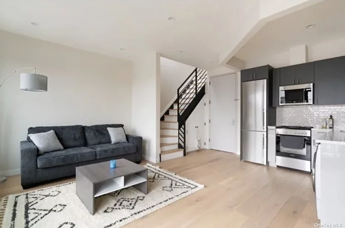 Welcome to 1178 Green Ave 4R, the penthouse unit of a modern, newly constructed boutique condo located on a quiet tree-lined block in the increasingly popular neighborhood of Bushwick. 4R is a 585 sqft one (1bd) bedroom, one (1bth) bath duplex with a balcony and a privet roof (192 sq).  This superb home features a large open kitchen, living room, full bath and bedroom with access to the privet roof. Possibilities for the use of this space are endless, The first level has an open living area flooded with natural light, high ceilings, a kitchen is complete with custom matte gray cabinetry covered with quartz countertops, high-end stainless appliances including 36 KitchenAid refrigerators, Bloomberg dishwashers, pro-style electric Verona ranges, and vented hood. The sleekly designed bathroom features warm grey colors and has been outfitted with a deep soaking tub that will make you feel like your at the spa. Every detail was considered to highlight style and comfort. It will additionally be furnished including a hot tub!  Just a few minutes to the J/M/Z trains with the L being a few additional minutes away, getting into Manhattan is only 15 minutes by train and even closer to Williamsburg.  Endless dining options along Wilson, Knickerbocker and Wyckoff Ave. Many popular spots close by such as Sunrise/Sunset, Nene&rsquo;s Deli Taqueria, FirstLive, IC Brooklyn Cafe, Maite, Caffeine Underground, and more! Night life not far either, with Houst of Yes, Brooklyn Mirage, Nowadays and more in the neighborhood.