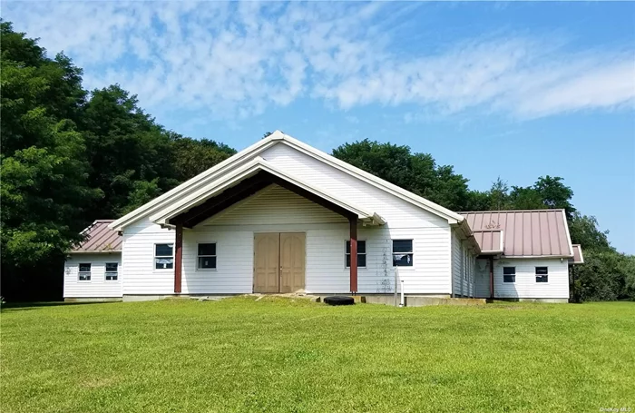 This A-C zoned 160, 000 square foot (3.68-acres) property is currently improved by a large steel-framed clear span community center building. Many interesting uses are possible--bring your imagination!