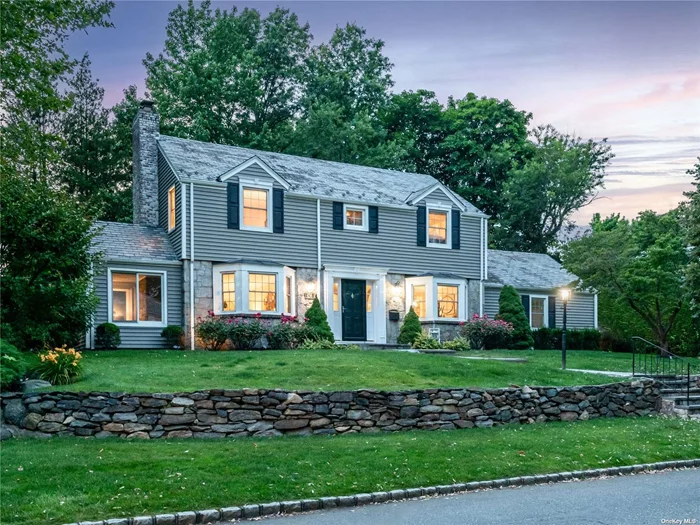 Updated with modern flair, this classic Munsey Park colonial is timeless and refined. Featuring approximately 2400 sq ft of comfortable living space, it&rsquo;s the perfect home to work, entertain, gather and relax with ease. The first floor includes a gracious entry foyer, large living room with an elegant fireplace, a private home office with abundant windows, a formal dining room, a modern eat-in kitchen with new, high-end appliances and an adjoining spacious family room with fireplace. Additionally, there is a first floor bedroom and full bathroom, ideal for guests. Upstairs, there is a primary bedroom with a renovated bathroom, two additional bedrooms and a spacious hall bathroom. All bathrooms are classic white, with the finest materials and Toto toilets. Additional highlights include a 2-car garage, spacious driveway, updated heating and cooling, new siding and gutters. Outdoors, you will enjoy a large, landscaped property with patio for outdoor gatherings. Munsey Park Elementary. Conveniently located close to schools, parks, town, train, and shopping.