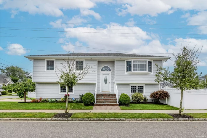 WE HAVE THE PERFECT HOUSE FOR YOU RIGHT HERE ON CURLEW! THIS NEWLY RENOVATED 3 BED, 2 BATH HI RANCH IS NESTLED IN THE BEAUTIFUL NASSAU SHORES SECTION OF MASSAPEQUA. STEP INTO THE OPEN-CONCEPT LIVING ROOM, DINING ROOM, AND KITCHEN, ALL WITH PRISTINE HARDWOOD FLOORS. THE BRAND NEW KITCHEN BOASTS STAINLESS STEEL APPLIANCES AND QUARTZ COUNTERTOPS.... THE TOP FLOOR FEATURES THREE SPACIOUS BEDROOMS AND A FULL BATHROOM. DOWNSTAIRS, YOU&rsquo;LL FIND A LARGE ENTERTAINMENT ROOM WITH TILE FLOORS AND A SLIDING DOOR LEADING TO THE YARD. THE LOWER LEVEL ALSO INCLUDES ANOTHER FULL BATHROOM AND A LAUNDRY ROOM.... THE ATTACHED 2-CAR GARAGE IS PERFECT FOR CAR ENTHUSIASTS OR EXTRA STORAGE. THE HOME COMES WITH ALL THE EXTRAS: 3 ZONE HEATING, SEPARATE HOT WATER HEATER, 5 ZONE IN-GROUND SPRINKLER SYSTEM, CENTRAL AIR, UPDATED ELECTRIC, ANDERSEN WINDOWS, A PVC FENCE, PRIVATE YARD, TREX DECK, AND AN ELECTRIC AWNING... GAS IN THE STREET!! IMPORTANT: SELLER WILL ENTERTAIN OFFERS WITH SELLER FINANCING TERMS, ENSURING AN EVEN FASTER CLOSING