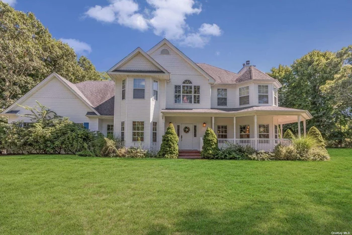 Hidden down a flag lot, just west of Westhampton Beach&rsquo;s Main Street and village beaches you will find this secluded 5-bedroom, 4.5 bath glorious beach house with 2715 SF of interior living spaces and an additional 1, 000 SF finished walk out basement. An inviting double height foyer welcomes you to the open floor plan creating the space to entertain with ease. The first floor interiors include an oversized Chef&rsquo;s eat-in-kitchen with Viking appliances, enormous island & lots of storage, an inviting dining room, spacious living room with fireplace, plus an additional den/play room. The second floor boasts four spacious bedrooms each with generous closet space, large windows and ample privacy. The park- like setting includes extensive decking with a brick patio, fenced in with heated pool & spa. Additionally, there is a 1, 000 SF finished basement with bedroom, bathroom & playroom, plus a 2 car garage making this a complete package. Everything you need and more on 0.77 acre, just 1 mile to town & 2 miles to the closest beach.