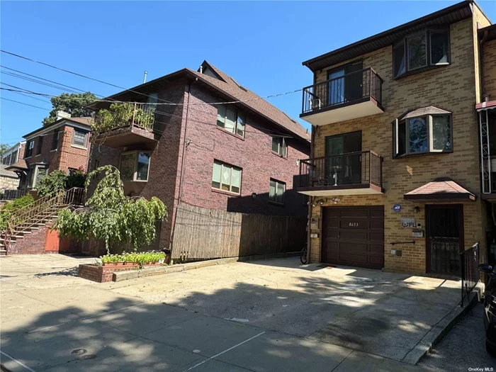 Semi attached Three-family Brick house built in 1990 of Jamaica Estates. building size 20x57. Appr. 3420 SF. All hardwood floors, each floor has individual HW boiler and hot water standalone gas heater. 1 Attached garage can walk-in to first floor. 3 parking spots on driveway. 1.5 blocks to bus stations. 2.5 blocks to F Train /179 Station. 3 Gas meters, 4 Elec meters and 1 water Meter. 1.3 miles to St John&rsquo;s University. 2 blocks to Immaculate Conception of Jamaica Religious Educati