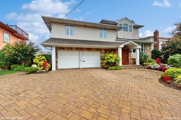 This waterfront 4 bedroom, 4 bathroom residence offers a unique blend of classic charm and modern functionality. Built in 1960 and expanded in 1997 with the addition of a top floor primary bedroom & study, the home underwent another renovation in 2011, which added an exercise room next to an indoor resistance pool and hot tub, as well as extensive updates to the backyard. Situated on a prime waterfront lot in South Merrick, this property provides direct open water access to the South Shore bays and ocean, ideal for boating and enjoying tranquil water views. The home features central air conditioning with two zones, a fully electric kitchen, a gas-powered water heater and a gas generator for backup power. The home is in the outstanding Bellmore-Merrick School district with easy access to Jones Beach State Park and Theater, as well as the extensive shopping around the Roosevelt Field Mall.