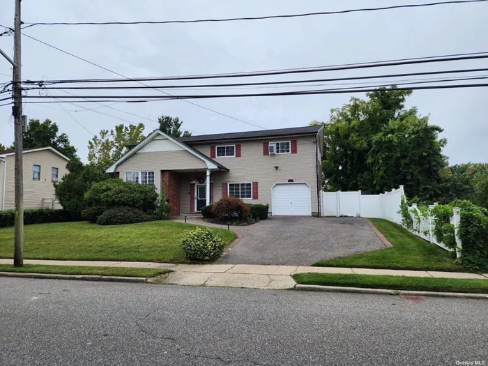 This Beautiful 4 Bedroom 2.5 Bath Large Colonial is Truly a Dream. Features Large Custom Kitchen With S.S Applainces, Quartz Countertops & Farm Sink. Crown Molding, Large 4 Seasons Room off Back of the House For Entertaining, Updated Baths, New Roof, Recessed Lighting, 200 Amp Service, PVC Fencing, Custom Window Treatments, Finished Basement, Close to all Parkways, Shopping, Schools & Public Pool.