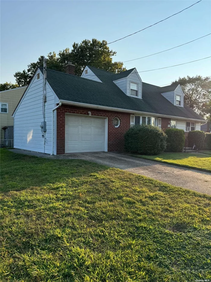 House is sold totally AS IS. Oversized expanded Cape on park like 67x100 Lot. Full Basement same size as first floor. Center hall cape with coat closet in entrance. Brand new bay window gazes out front of home. Hardwood floors under the carpet. Attached 1.5 garage with remote control garage door. In ground sprinklers 6 zone. Oversized Cape style home sits on residential street lot size 67x100. Extra spacious rooms 14x14 14x14 18x26 18x26 and more .Spectacular curb appeal Oil heat -however , there is gas on the street. Most desirable location