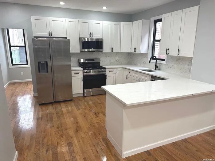 Welcome to this stunning, fully renovated gem in the heart of Canarsie, Brooklyn! This spacious home boasts 3 bedrooms, 1.5 modern bathrooms, and a flexible layout with the potential for a 4th bedroomon the ground floor-perfect for a growing family, home office, or a 1st floor laundry room. Featuring high-end finishes throughout, this home combines style and function with open-concept living spaces, a sleek kitchen, and plenty of natural light. Close to everything Canarsie has to offer. A must-see!