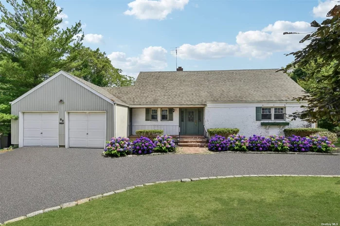 Welcome to 98 Middle Road in beautiful Blue Point, NY! This charming 3-bedroom, 2-bathroom home offers 1, 900 square feet of comfortable living space on a sprawling 1.42-acre lot. Inside you are welcomed into a bright charming home with updates throughout. The living room features original beams throughout the ceiling, as well as a wood-burning fireplace, perfect for those chilly evenings. The living room also features a wall of windows and a huge glass sliding door overlooking your preserve-like property and creekfront setting. A sunroom also offers you panoramic views of this beautiful property. The formal dining room is ideal for entertaining guests, and the newly refinished hardwood floors throughout add a touch of elegance. Enter the country-style kitchen through the antique stained glass pocket door. The kitchen is complete with a brand-new refrigerator, dishwasher, sink, stove, and beautiful Quartz countertops. Handy built-ins throughout the home offer additional storage as well as charm. The primary bedroom is located on the first floor and boasts a walk-in closet and new carpeting as well as a full bathroom. In addition to the living room, there is also a den or possible 4th bedroom/office on the main level. Upstairs you will find 2 additional bedrooms and a full bathroom. Updates throughout the home include all new windows and glass sliders, new insulation, an updated roof, a brand new boiler and on-demand water heater, new kitchen appliances as well as a new washer and dryer, updated CAC, newly refinished hardwood floors, entire interior freshly painted, brand new carpets, and last but not least new light fixtures throughout! The full basement offers plenty of additional storage or potential for a home gym or workshop. The oversized 2-car attached garage and huge circular driveway make coming and going a breeze. Journey outside from the expansive wood deck and enjoy the serene park views and tranquil creekfront setting. The expansive lot offers tons of potential for gardening, outdoor activities on the creek like kayaking or stand-up paddleboarding, or simply relaxing and soaking in the panoramic views. Located on one of the most desirable streets in Blue Point and only minutes from the Great South Bay, make this truly charming home your own today.