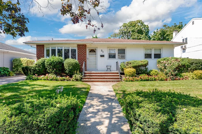 Pristine wide line ranch with main level den extension. Home is spacious with large eat in kitchen, formal dining room, formal living room, hardwood floors, king size primary bedroom and second full bath in the den which was added behind the kitchen with exit to yard. Gas heating system, huge detached garage and great residential location close to shops, Mt. Sinai Hospital and eateries! This is a VERY quiet road yet close to all. Just 1.5 miles to the Village of Rockville Centre. No flood insurance required. Great opportunity!