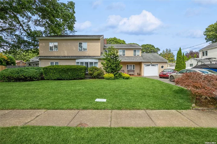 WELCOME HOME TO THIS BEAUTIFUL 3, 000SQ FOOT COLONIAL, LOCATED IN WELL SOUGHT-AFTER MASSAPEQUA WOODS. THIS HOME SHOWCASES AN EASY OPEN FLOW AND LOTS OF NATURAL LIGHT. THE LIVINGROOM OPENS TO THE FORMAL DINING ROOM WHICH IS JUST ADJACENT TO THE GOURMET KITCHEN. LARGE ATTACHED SUNROOM, DEN WITH SLIDERS THAT LEADS TO A GORGEOUS STONE PAVER PATIO AND BEAUTIFUL HEATED INGROUND POOL.5 LARGE BEDROOMS 3 FULL BATHS AND PLENTY OF CLOSET SPACE , CONVENIENT TO PUBLIC TRANSPORTATION, SHOPS AND RESTAURANTS. THIS HOUSE HAS IT ALL.