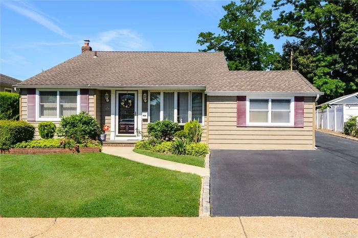 Welcome to this pristine 4 bedroom, 3 full bath home! This is a great home for entertaining featuring all wood flooring throughout and updated bathrooms. Featuring a gas boiler that&rsquo;s only 3 years old and picture-perfect newer vinyl siding and roof. The property is close to schools and shopping. Spacious lot includes an oversized detached 1 car garage, extended driveway with plenty of parking. A private flat yard, perfect for for gatherings and BBQ&rsquo;s, with mature plantings and in-ground sprinklers. Large recreational area with full bath and a guest en-suite with private entrance, living area, bedroom, and full bath. THIS HOME IS A MUST SEE!