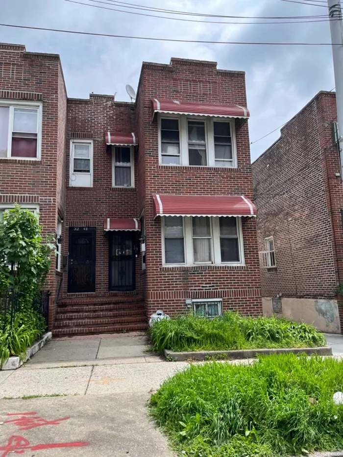 Legal 2 family brick house, semi detached, each level has 2 br, Lr/Dr, Kitchen, Full bath. Spacious back yard with parking space. Walkout basement with separate entrance. Walk to #7 train, Q66, Q48 and Q19 buses. Excellent investment opportunity.