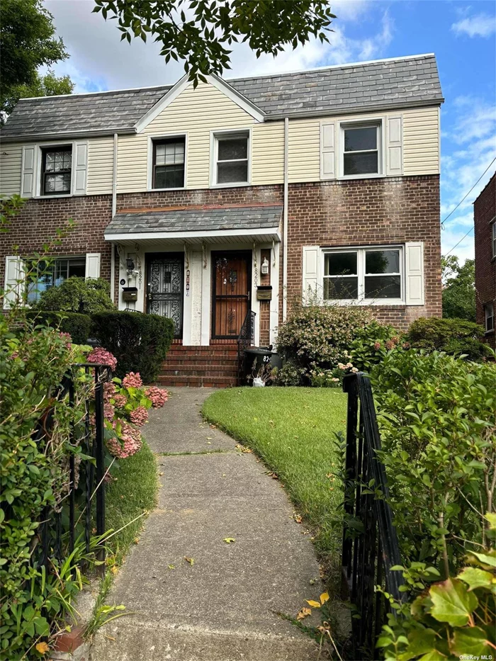 Attached brick colonial home on quiet tree-lined street with private driveway and 1car attached garage w/electric opener. )Hard wood floors under carpets, lots of storage. Full basement with outside/walkout private entrance. Nearby to everything, schools, shopping, transportation, hospital, etc.! Don&rsquo;t wait!