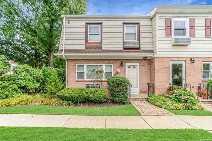 We are pleased to present an exceptional opportunity to for a generously sized end unit townhouse in Rockville Centre, offering three floors of living space. This residence includes a sizable living room, dining room, powder room, and a kitchen equipped with counter seating. The property has been newly carpeted throughout. The first floor provides access to a rear patio, perfect for outdoor relaxation. The primary bedroom features ample closet space and an en-suite bathroom, while the second bedroom also includes a private bathroom. Additionally, this unit boasts a fully finished basement with high ceilings and a dedicated utility/laundry room. The unit includes two assigned parking spots conveniently located in front. Situated close to the Long Island Rail Road (LIRR), this co-op is offered for sale in its current AS-IS condition.