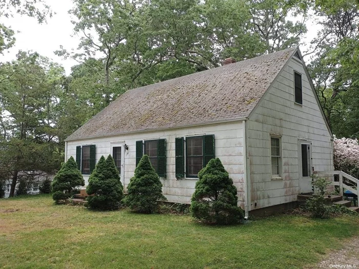 Quaint Cape on a large lot (100x125) with water rights and access to Little Fresh Pond. Super quiet street in a wooded area, a stones throw to the pond. 3 Bedrooms, 1 full bath, Eat in kitchen. Full basement with high ceilings. Add some updates and dormers and you have a magnificent Colonial style home overlooking the pond with a great yard!