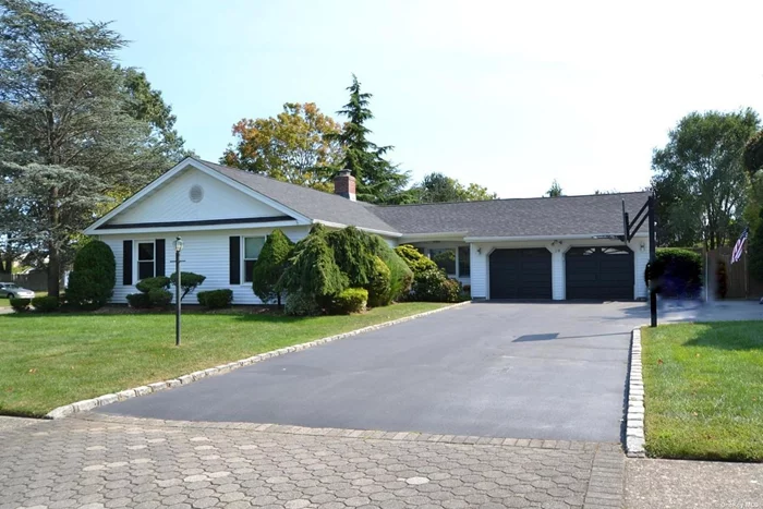 Welcome to this beautiful Ranch style home in the Sayville school district. Cathedral ceilings throughout the living space create an open and airy atmosphere ideal for relaxation and gatherings. A dual-sided wood burning fireplace provides a cozy addition and enhances the inviting living space. There is an updated kitchen with stainless steel appliances and an adjacent pantry and laundry area. You will also find a versatile bonus room that can be used as a home office or mudroom. Three bedrooms and two full bathrooms include a primary bedroom ensuite for privacy and comfort. Step outside to the fully fenced backyard complete with a wood deck and in ground swimming pool featuring a separate brick patio and lush landscaping. Home features also include new central air conditioning, newer siding, and roof. This home is conveniently nearby to schools, parks,  shopping, Restaurants and local beaches.