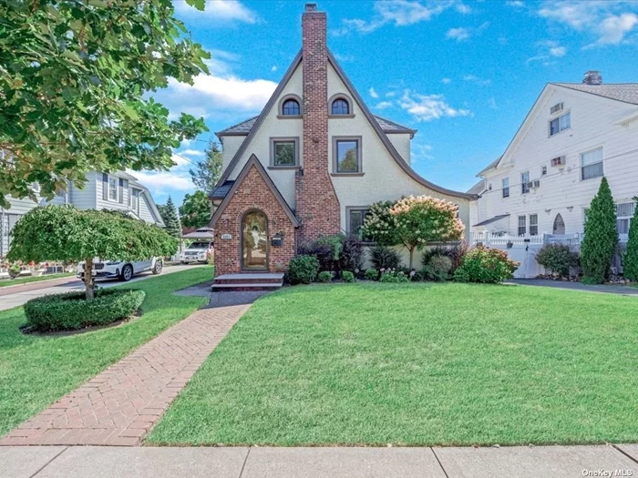 Welcome to our beautiful Tudor Home in the most desirable Broadway Flushing area of Queens. This elegantly appointed home has been completely renovated. This home boasts exceptional craftsmanship with custom moldings, coffered ceilings and wainscoting. No detail missed. Imagine gathering around the custom stone faced wood burning fireplace with family and friends while a delicious dinner is being prepared in the custom kitchen with custom cabinetry and a six burner Wolf stove. A chef&rsquo;s dream! Entertain with ease with flow throughout the first floor. This is the holiday celebration home for sure! This home offers the Tudor feel with contemporary flair. Offering three beautifully renovated bathrooms, five bedrooms and a fully finished tiled basement. So many upgrades including LED lighting, electric, plumbing, 6 split system A/C units, 5 zone in-ground sprinklers, new patio, Pella windows, french drains and much more. The location is PRIMO. A short distance to the beautiful Bowne Park for relaxation and turtle watching, two blocks to LIRR, one block to Northern Blvd, and a few miles to NYC. This beautiful area offers a quiet respite from the hustle and bustle of city life. Come make this dream home your reality!